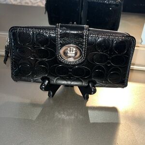 Coach embossed pattern leather zippered wallet with turn lock